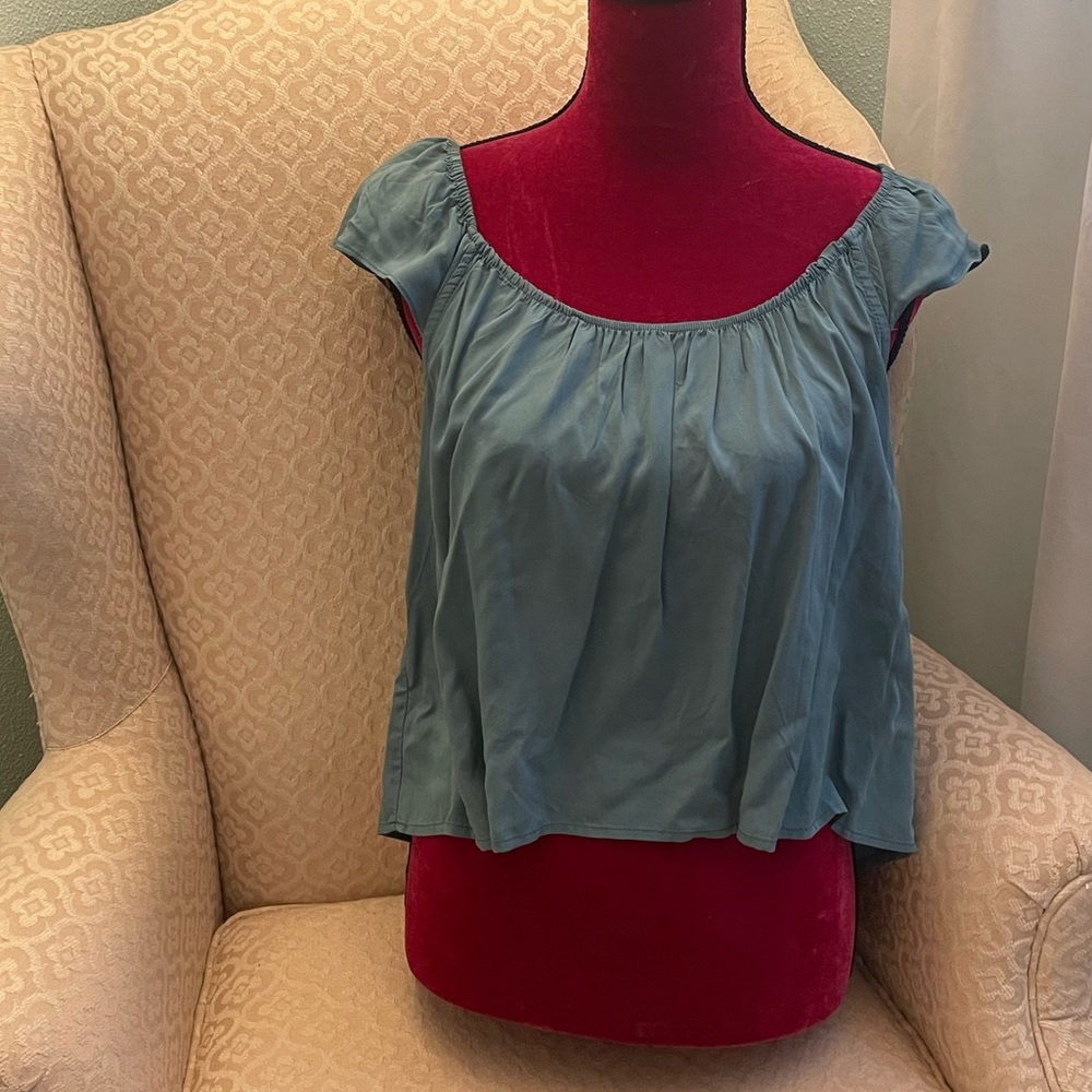 Women’s short sleeve blouse with cap sleeve in teal